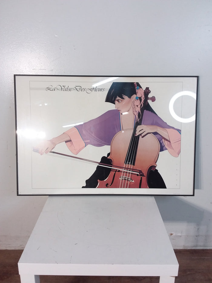 Woman Playing A Cello Framed Print