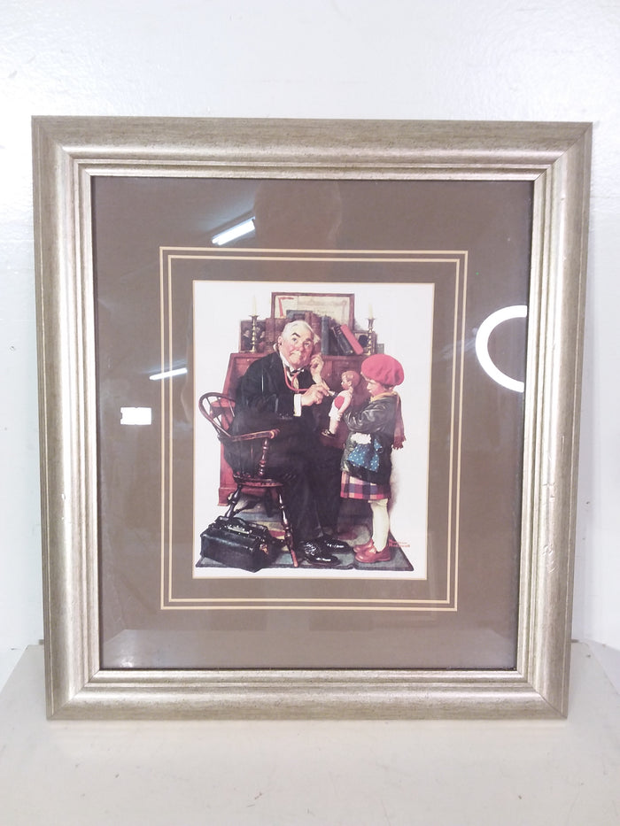 Norman Rockwell's 'The Doctor And The Doll' Framed Print