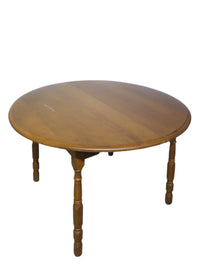 Round Maple Dining Table with 2 Leaf Extensions