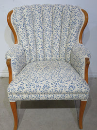 White Armchair with Blue Leaf Detail