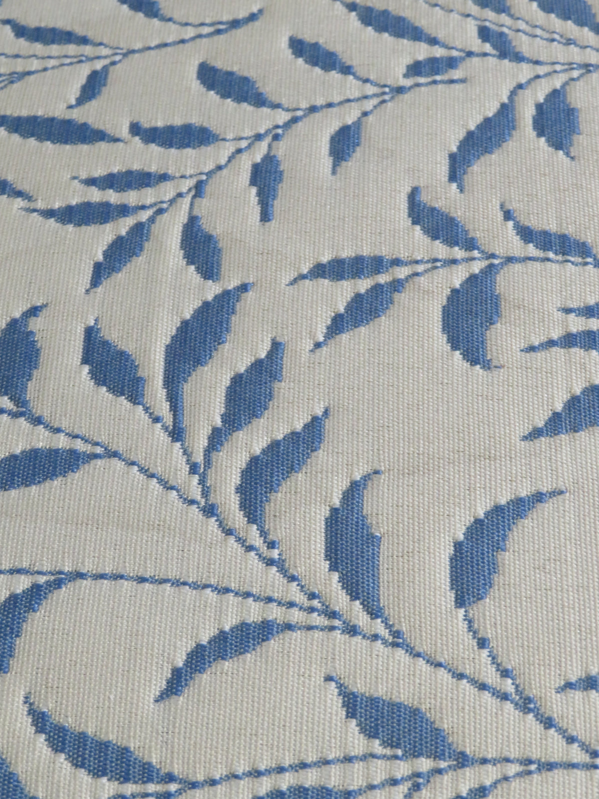 White Armchair with Blue Leaf Detail