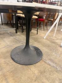 White Circular Modern Styled Table