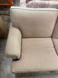 Tan Upholstered Loveseat