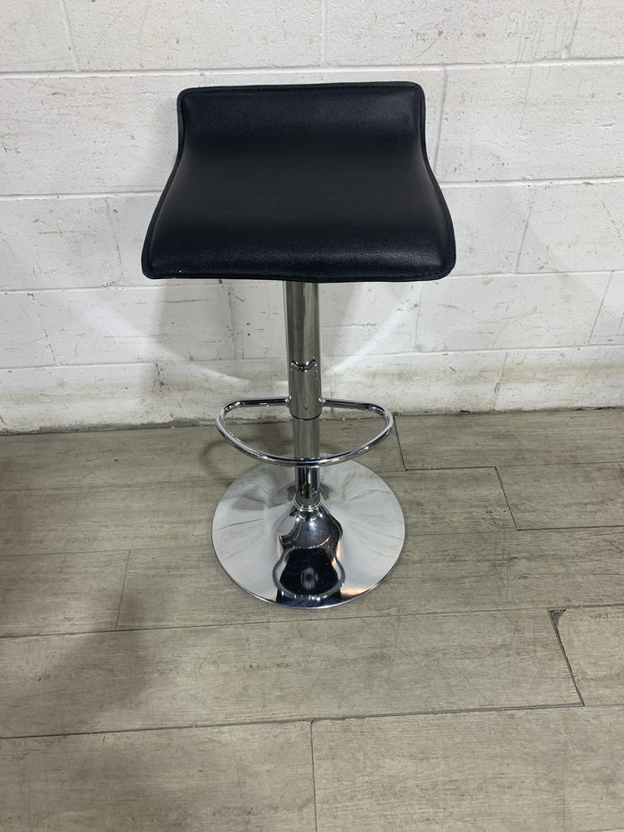 black padded Barstool