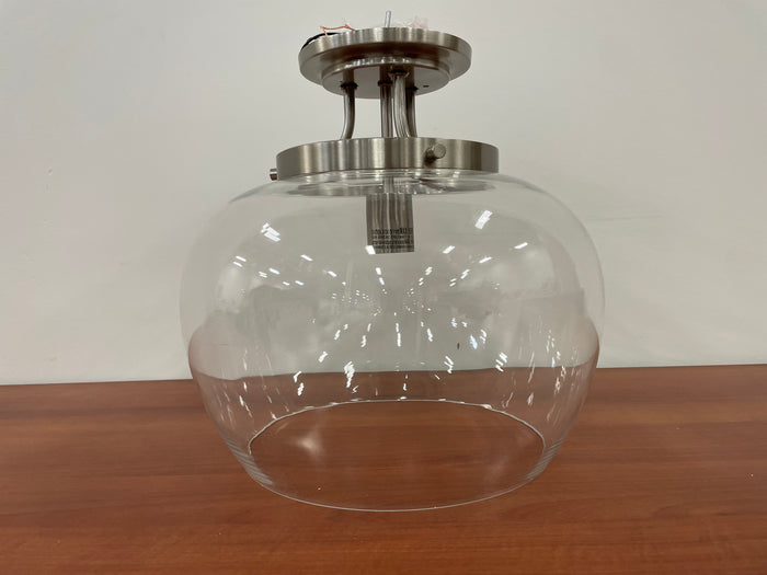 Single Clear Globe Flush Mount in Brushed Nickel