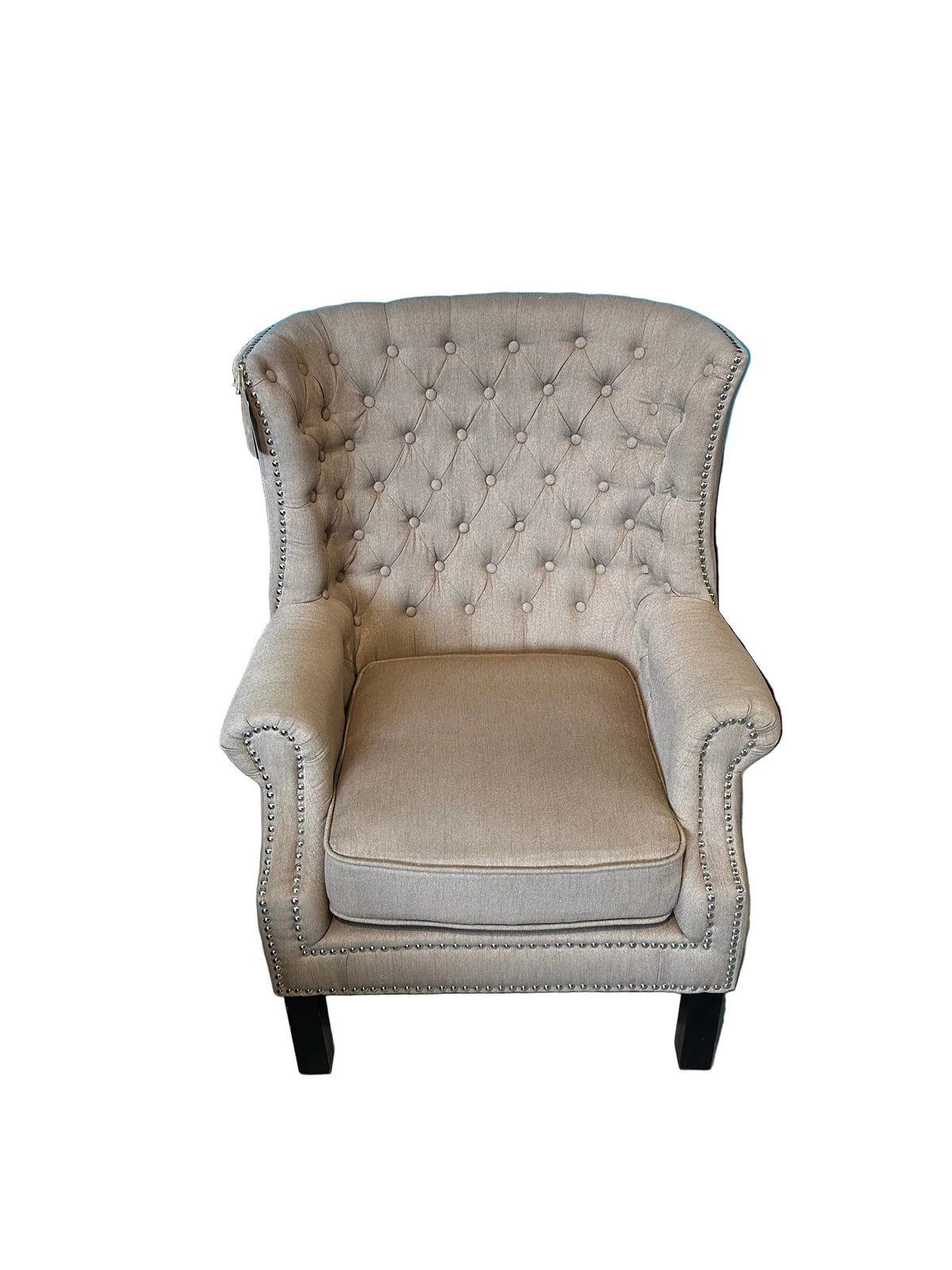 Tufted wingback armchair