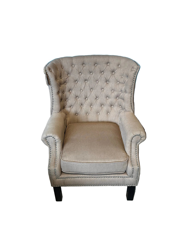 Tufted wingback armchair