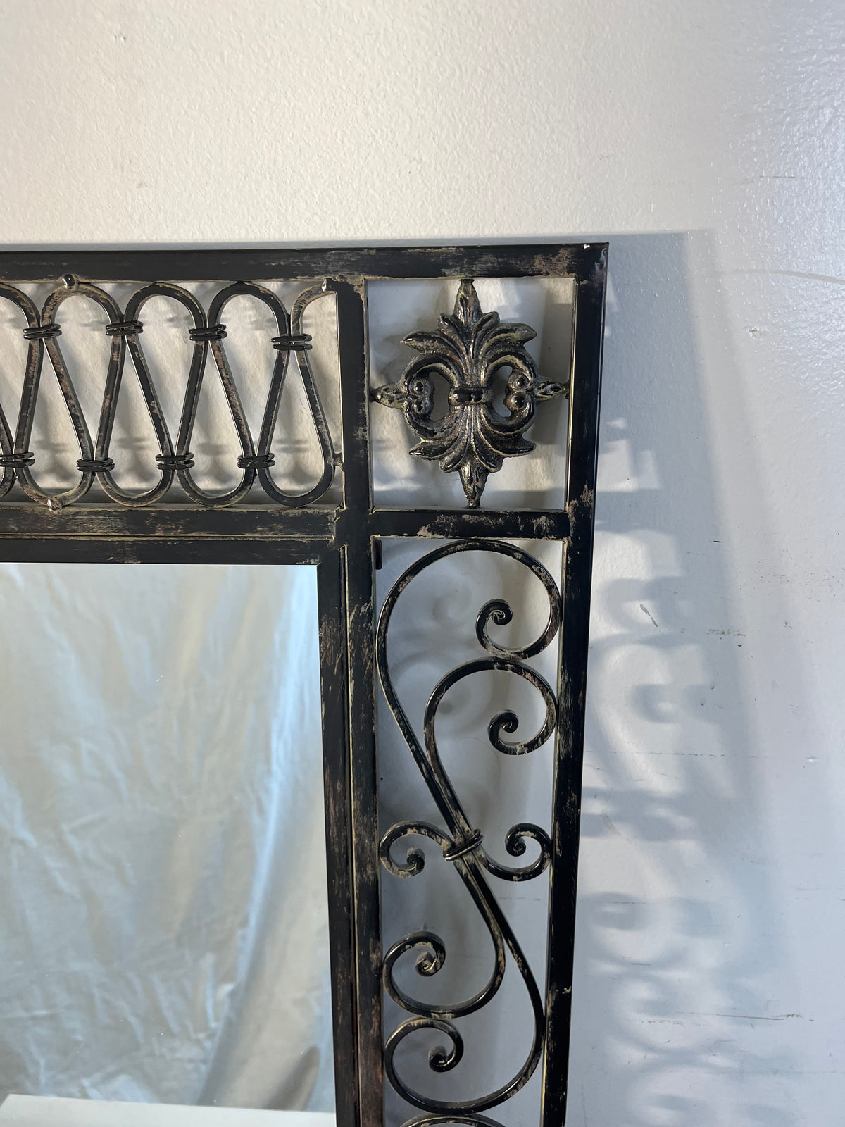 Wrought Iron Wall Mirror With Scroll Detailing