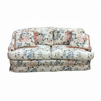 White Floral Loveseat with Throw Pillows