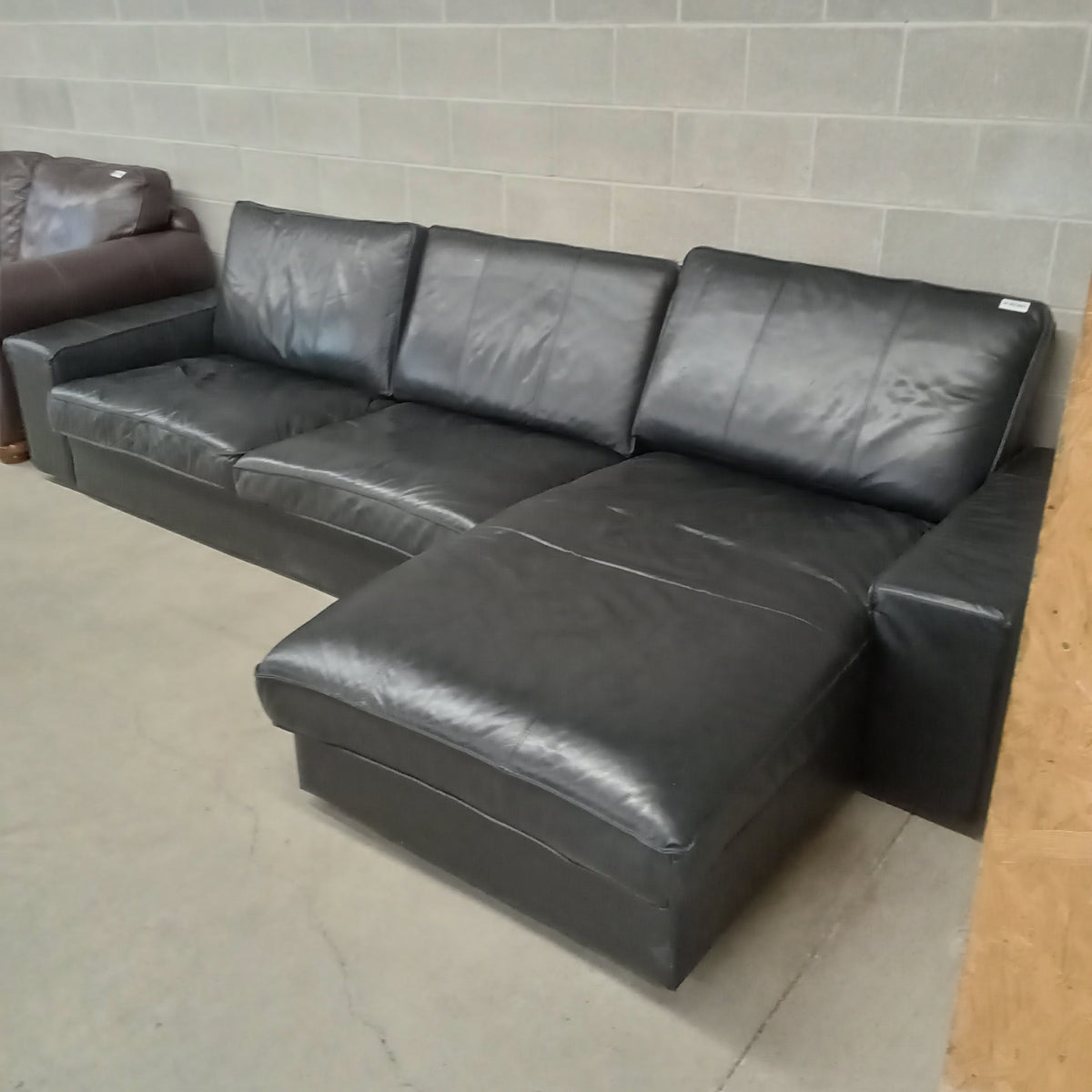 125"W 2-Piece Black Leather Sectional Sofa