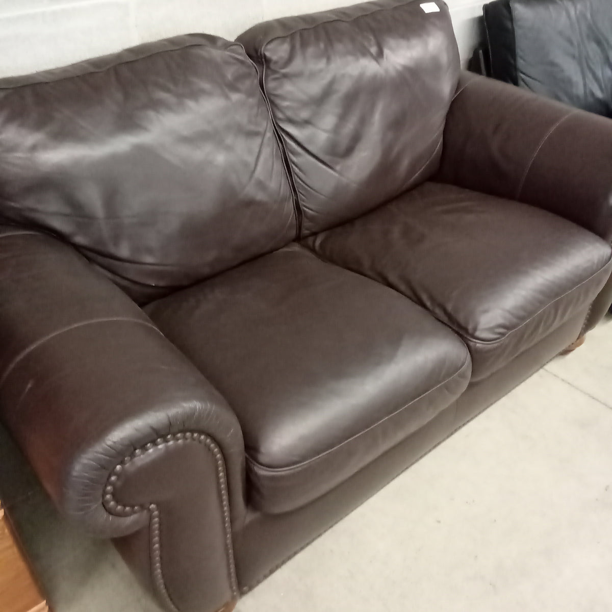 66"W Brown Leather Love Seat