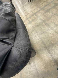 Dark Colored Faux Leather Armchair