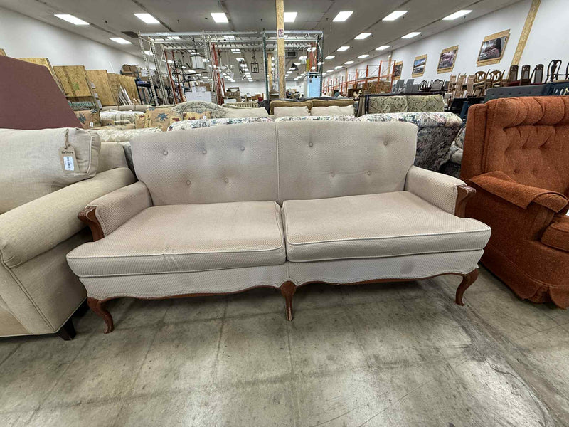 Light Colored Two-Seater Sofa