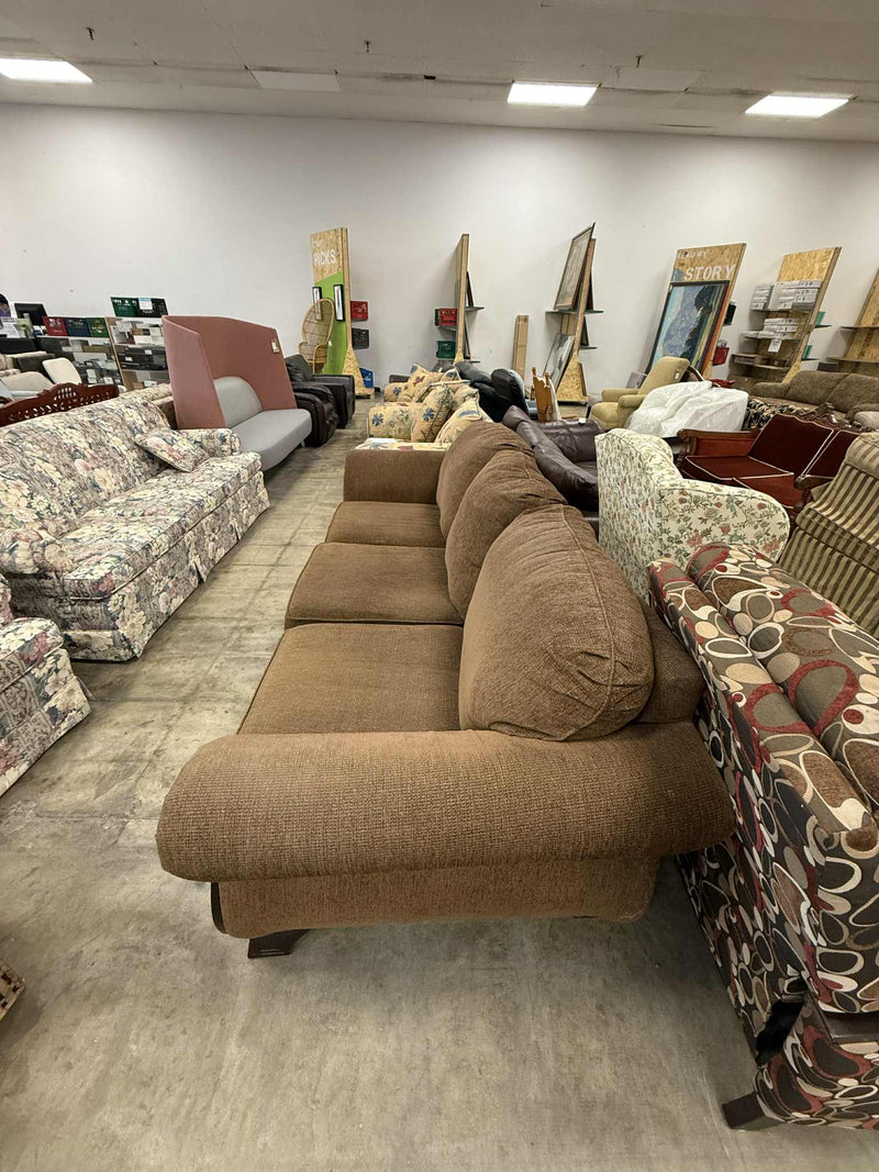 Brown Colored Three Seater Sofa