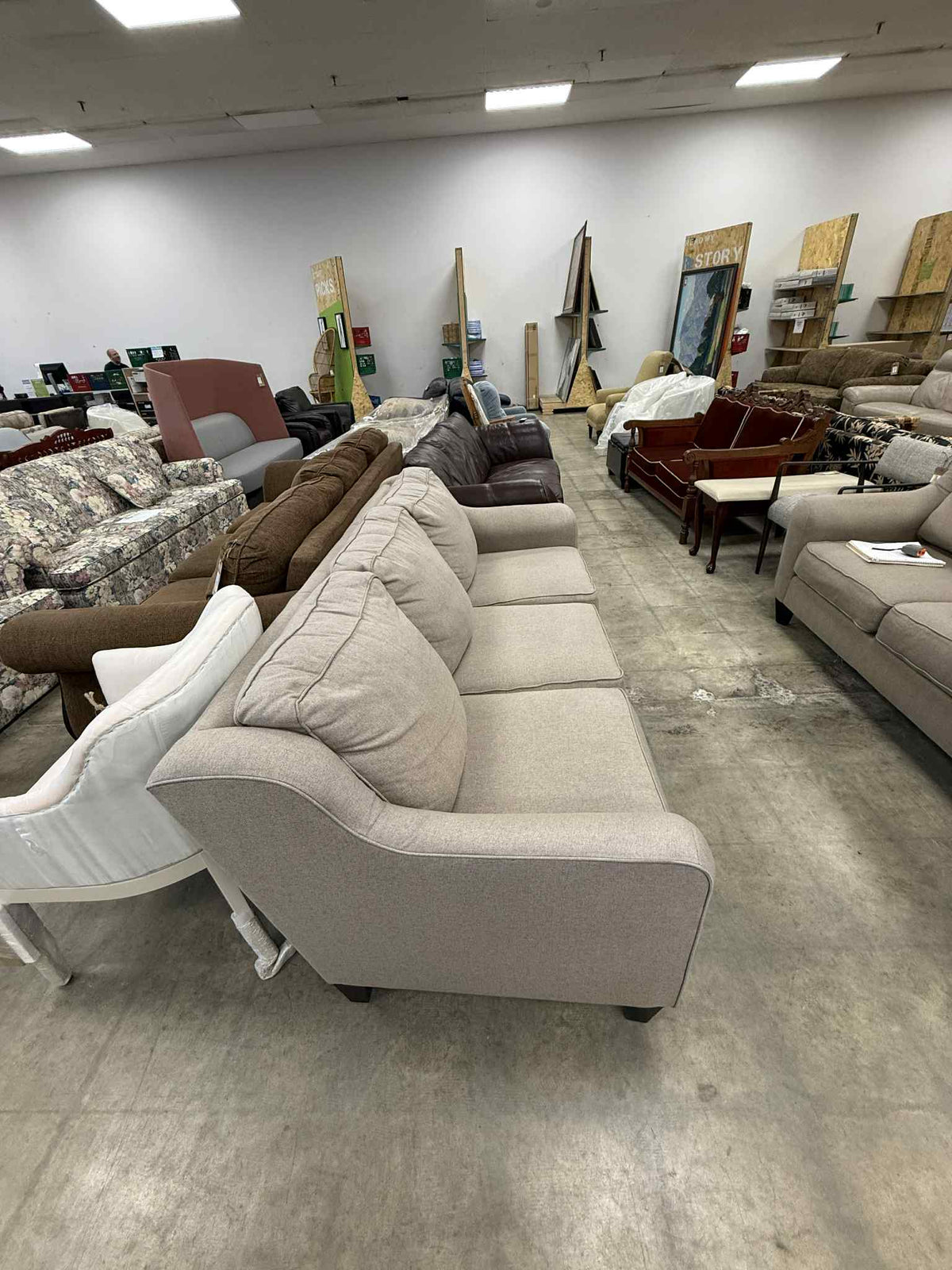 Light Colored Three Seater Sofa