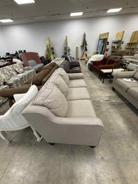 Light Colored Three Seater Sofa