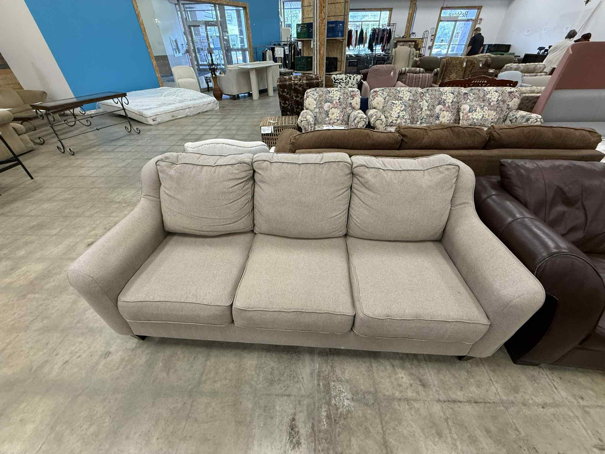 Light Colored Three Seater Sofa