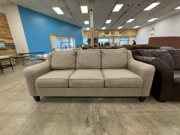 Light Colored Three Seater Sofa