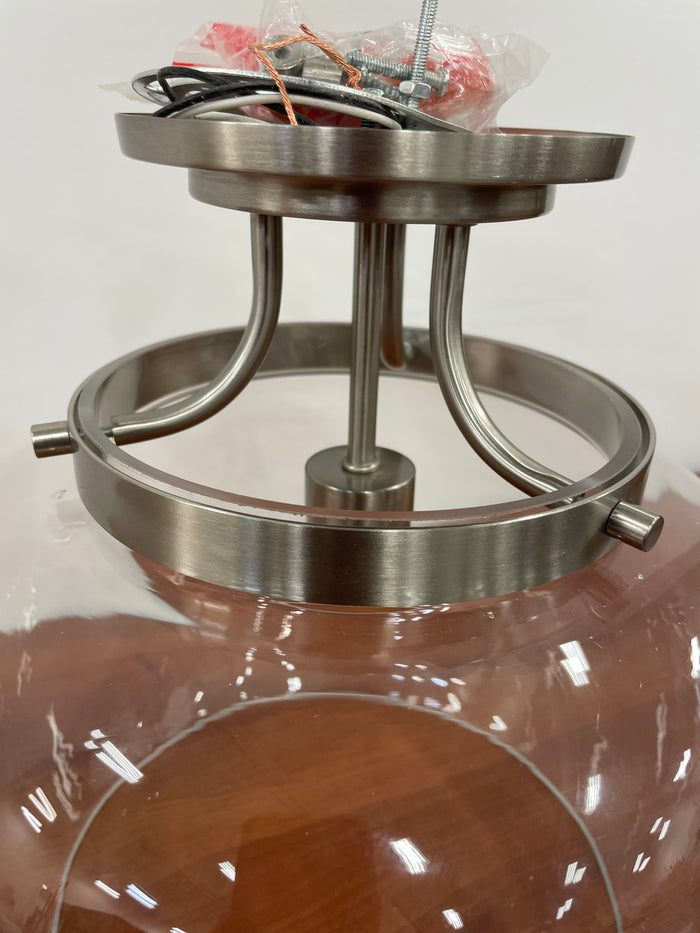 Single Clear Globe Flush Mount in Brushed Nickel