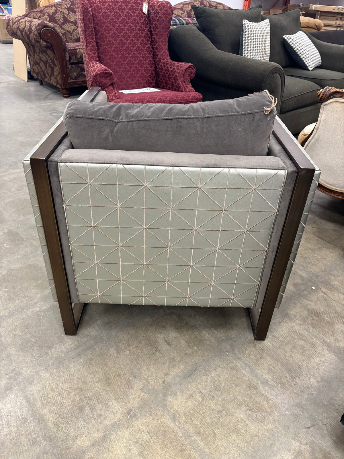 Grey Lounge Chair with Patterned Sides