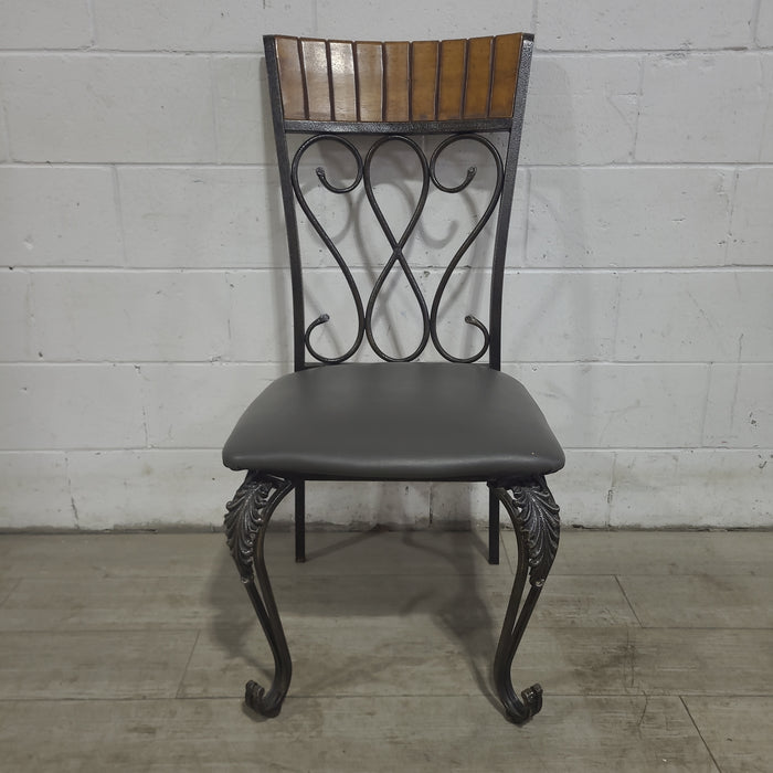 Set Of Four Cushioned Wrought Iron  Dining Chairs