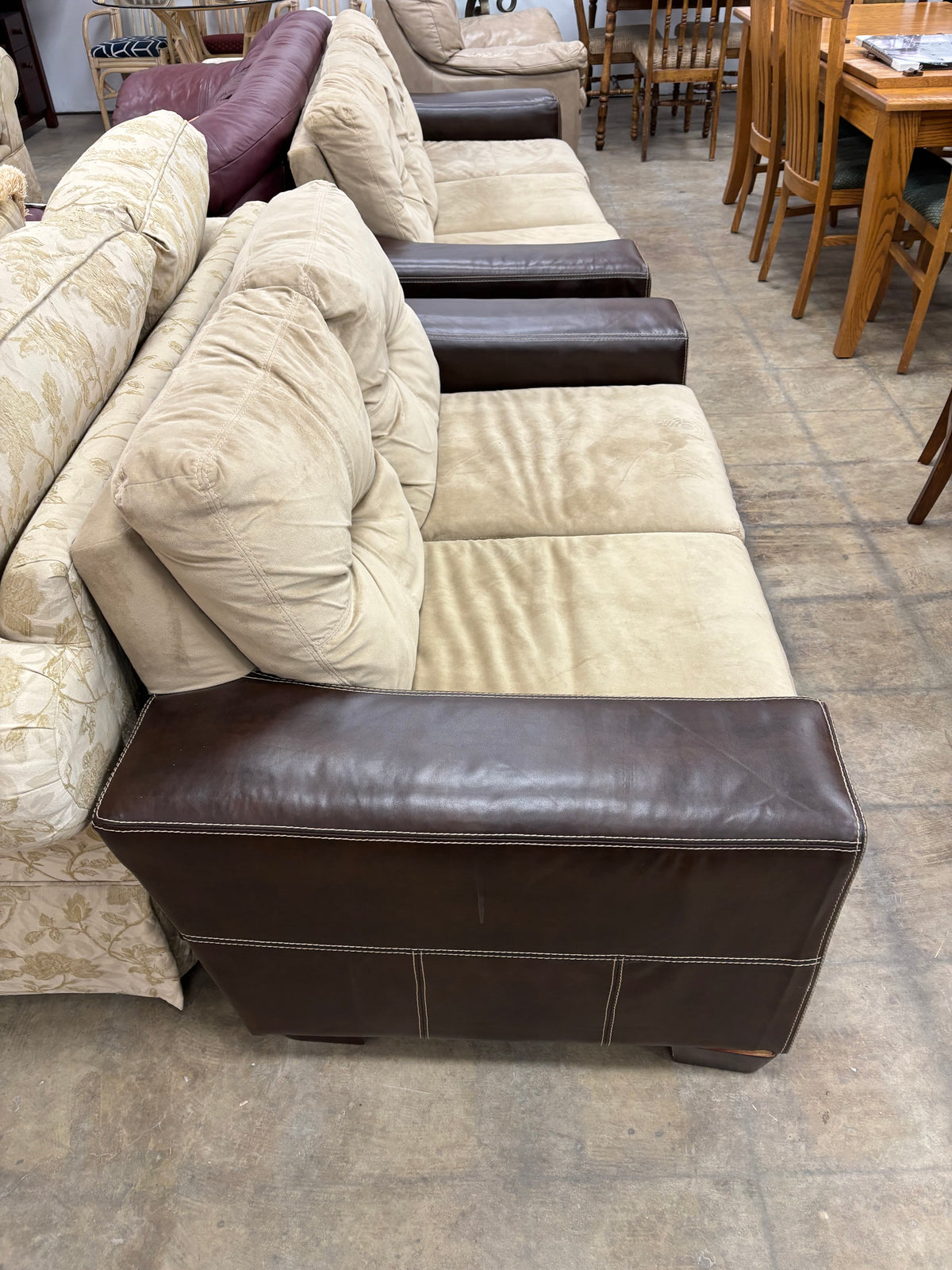 Beige Loveseat with Faux Leather Base