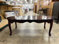 Long Circular Dark Mahogany Coffee Table