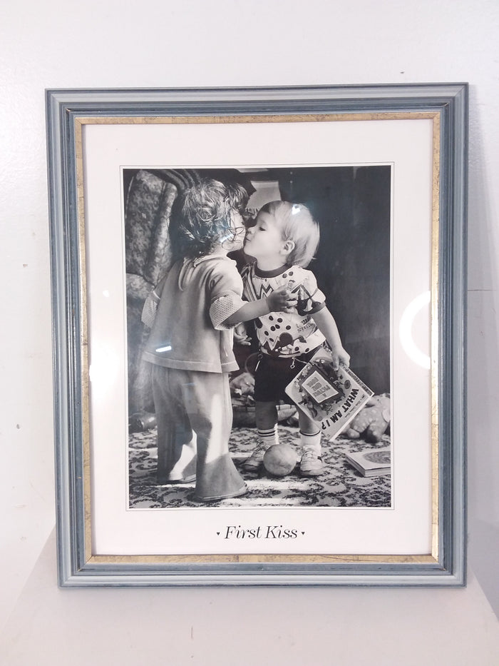 First Kiss Framed Print
