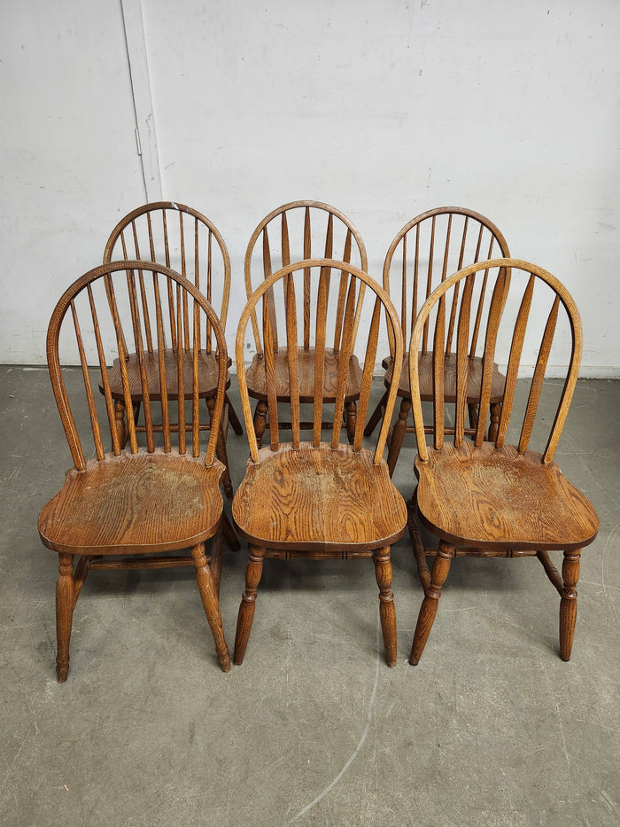 A Set of Oak Windsor Dining Chairs
