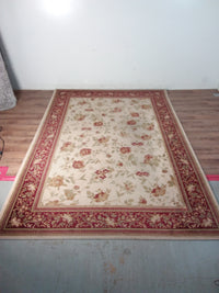 Red & Tan Rug (6 ft. 6 3/4" x 9 ft. 7 3/4"