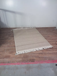 4 ft x 5 ft 3 in Brown Rug