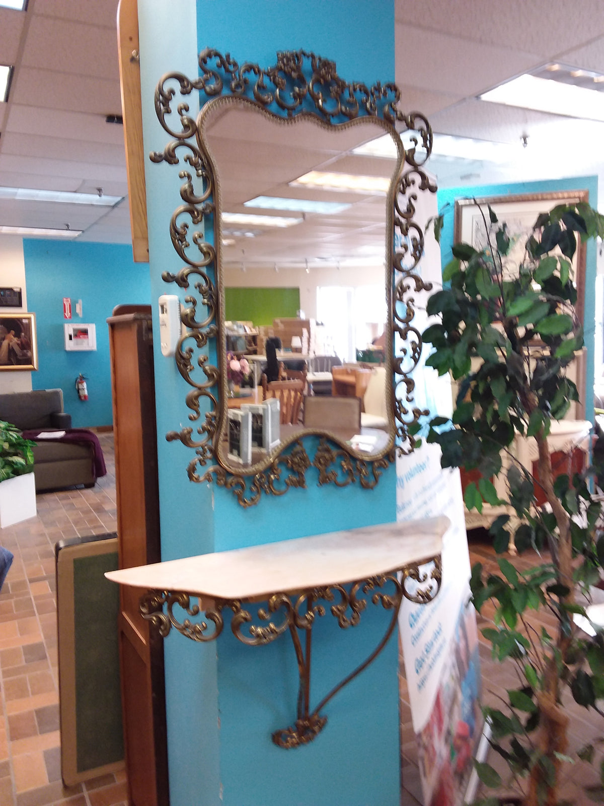 Metal Framed Mirror With Shelf