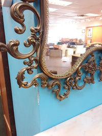 Metal Framed Mirror With Shelf