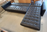 Black Vinyl Sectional Sofa with Silver Legs