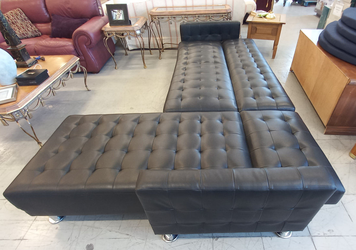 Black Vinyl Sectional Sofa with Silver Legs