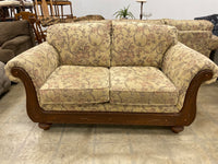 Floral And Dark Wood Loveseat