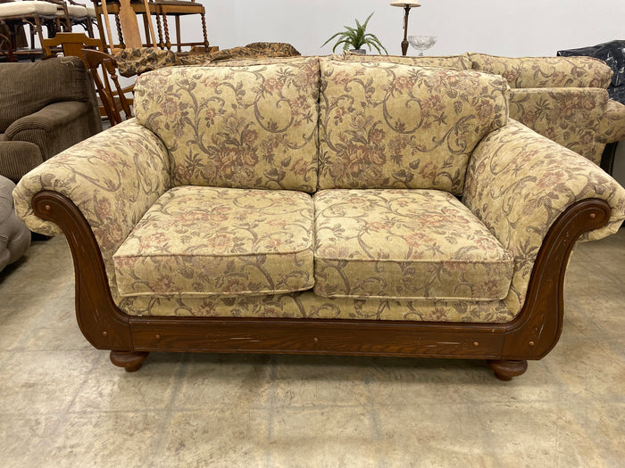Floral And Dark Wood Loveseat