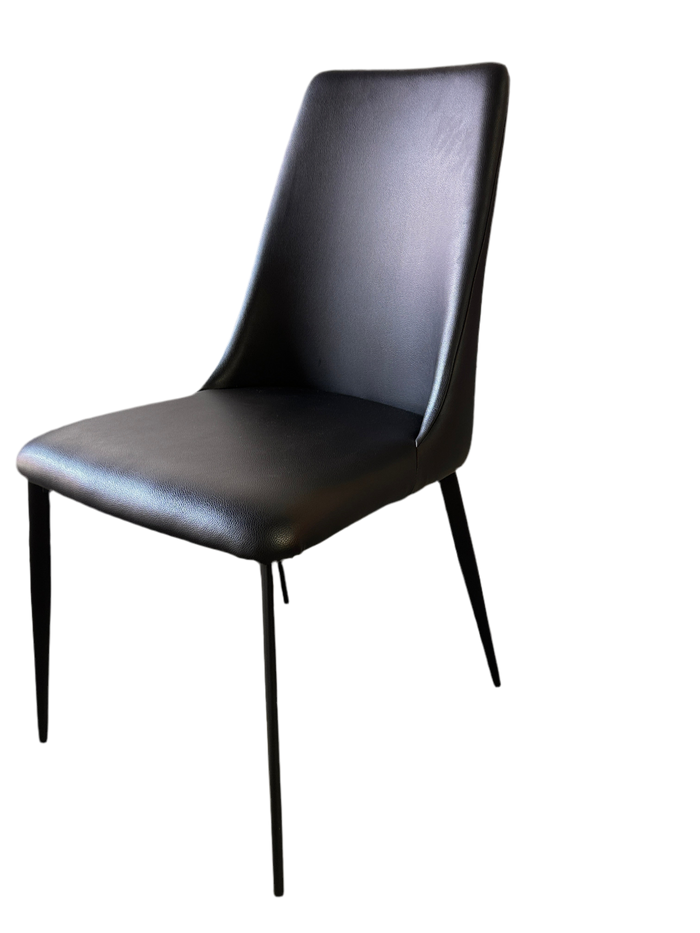 Set of four black dining chairs