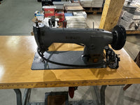 Singer 331K4 Industrial Sewing Machine with a Table