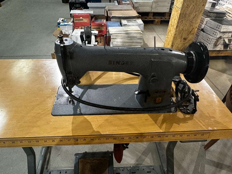Singer 331K4 Industrial Sewing Machine with a Table