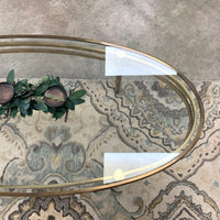 54.5-Inch W Oval Coffee Table – Brushed Brass Frame with Glass Insert
