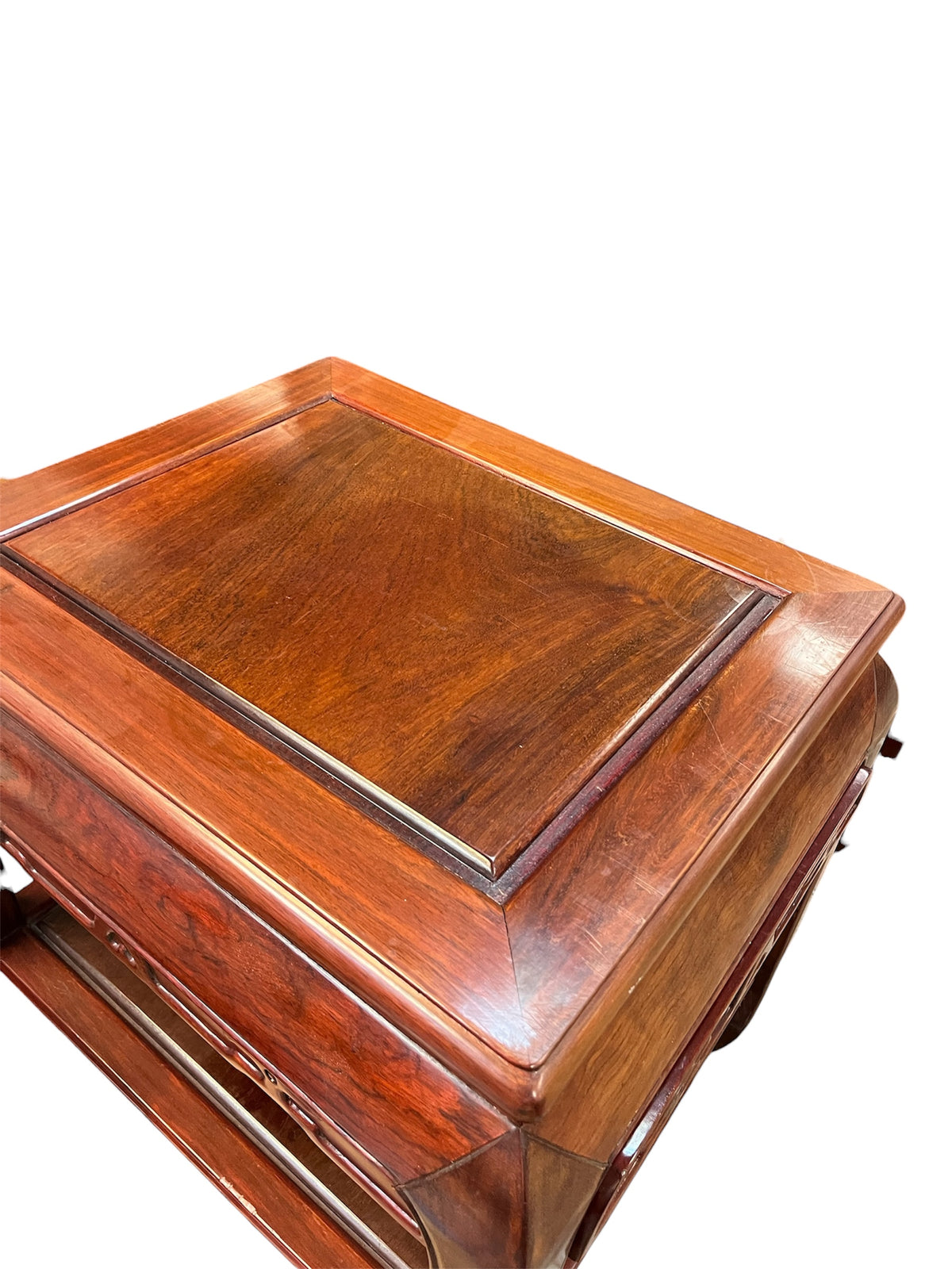 Red Tone Side Table with Carvings and Lower Shelf