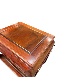 Red Tone Side Table with Carvings and Lower Shelf