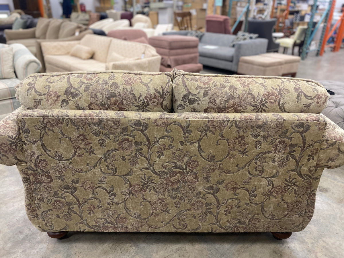 Floral And Dark Wood Loveseat