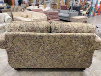 Floral And Dark Wood Loveseat