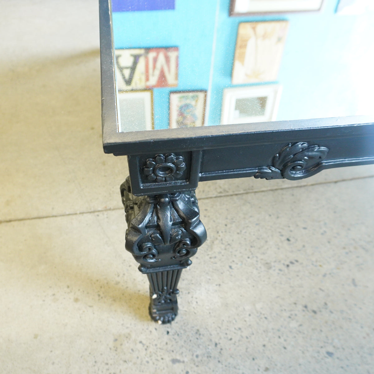 43-inch W Mirrored Top Coffee Table in Matte Black