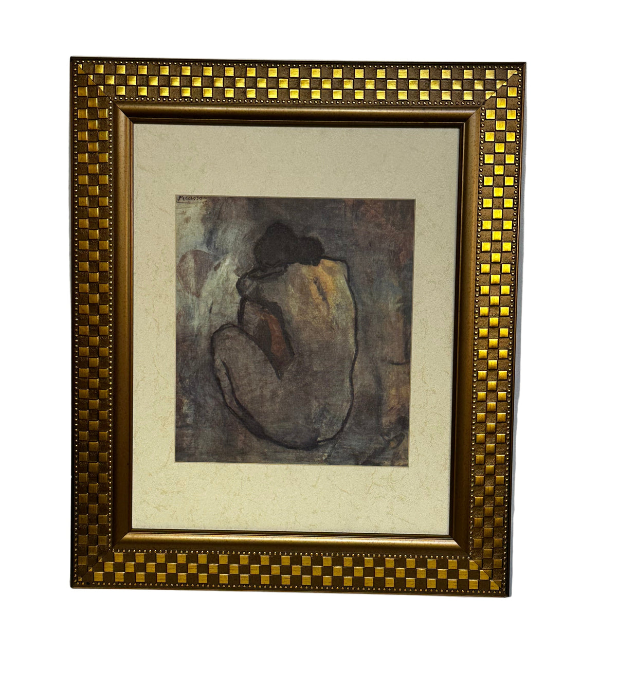 Print of "Blue Nude" (1902) by the Spanish artist Pablo Picasso.