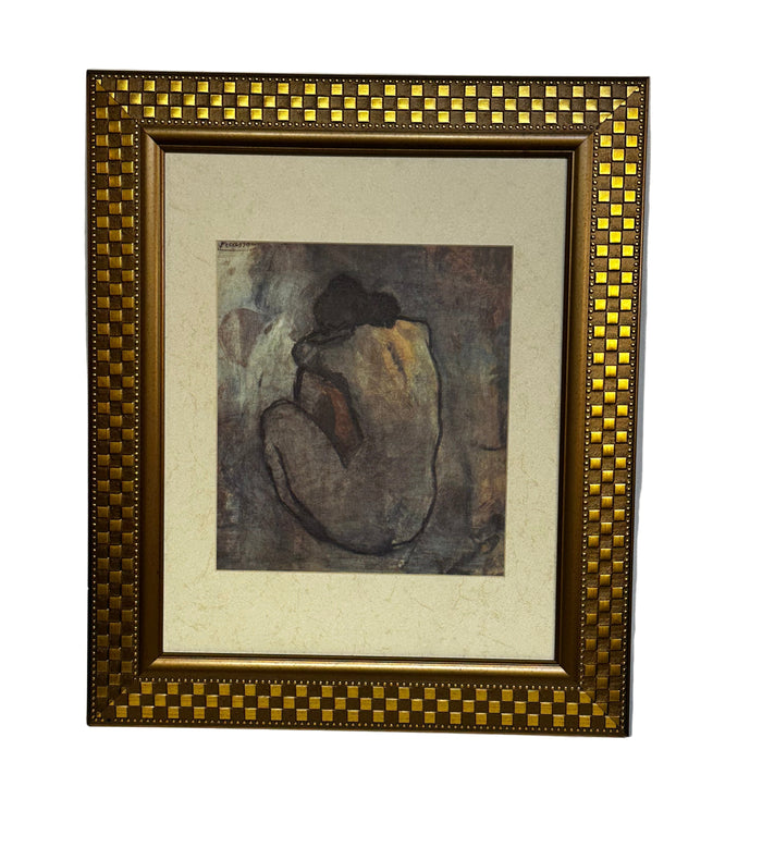 Print of "Blue Nude" (1902) by the Spanish artist Pablo Picasso.