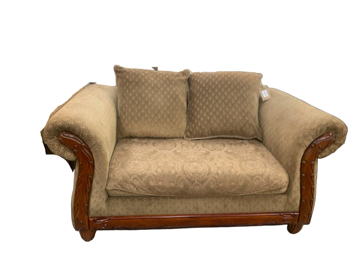 Brown Love Seat With Patterns
