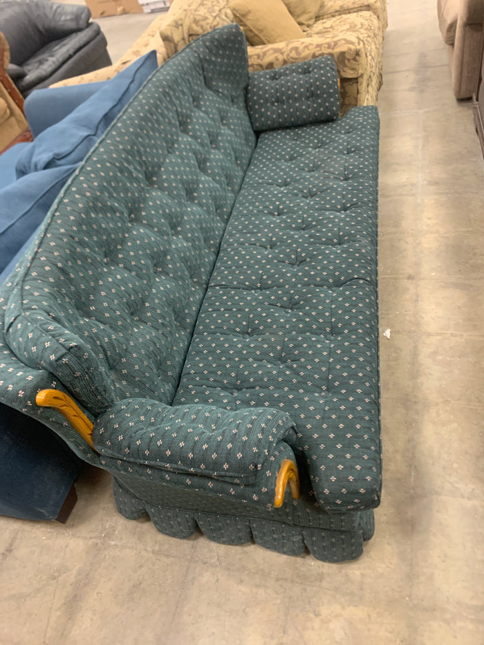 Green Sofa With Wood Accents